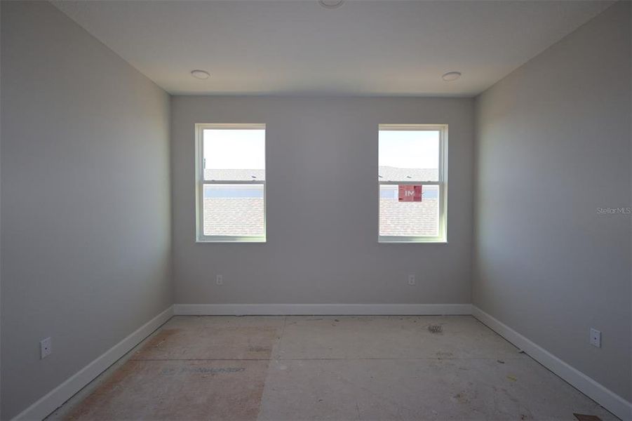 In-progress construction of a new home in Lake Star at Ovation, Winter Garden, FL (Image 12).