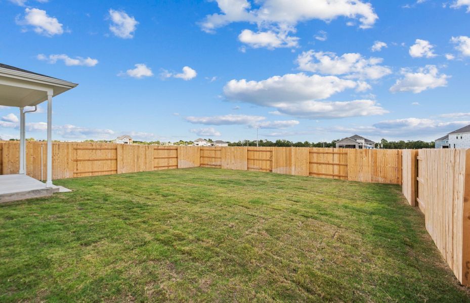 Exterior details and patio area of a home in Patterson Ranch, Georgetown (Image 18).