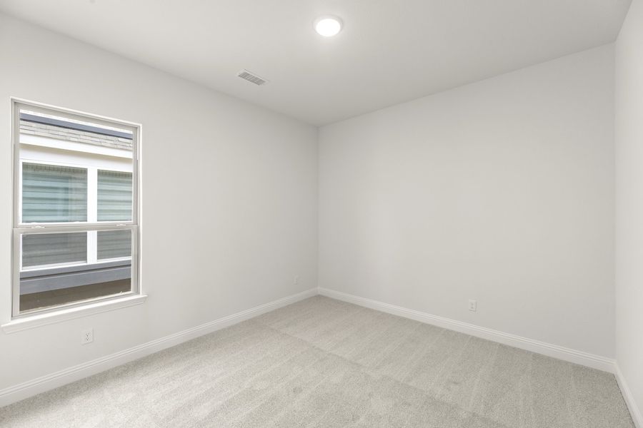 Representative unfurnished interior of a home built from the Crockett by Windsor Homes in Anna Town Square, Anna (Image 29).