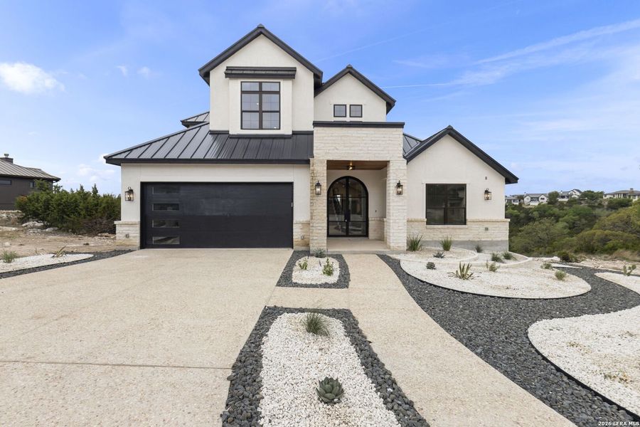 Front exterior of a new home in , Boerne, TX, highlighting curb appeal (Image 33).