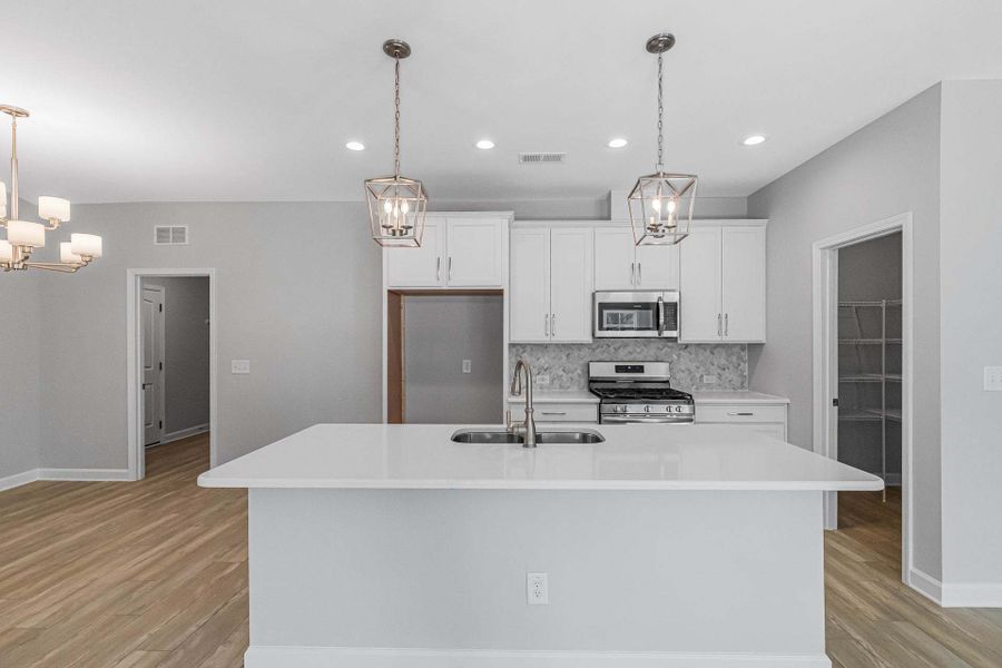 Representative furnished interior of a home built from the Weymouth by Caviness & Cates Communities in Bartlett Manor, Youngsville (Image 123).