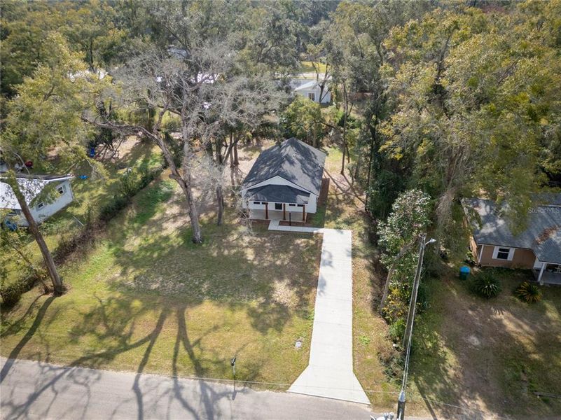 Front exterior of a new home in , Trenton, FL, highlighting curb appeal (Image 15).