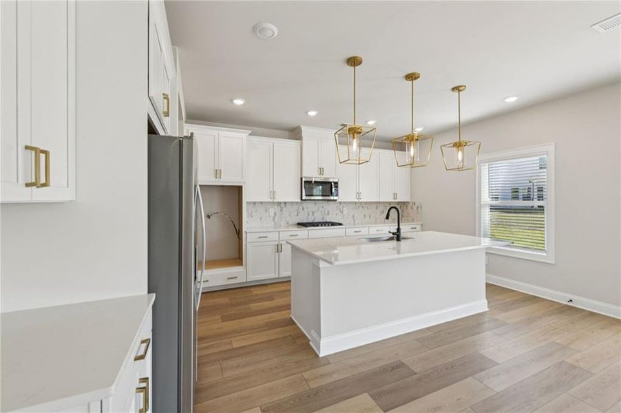 Furnished interior view inside a new home in Vines at Mill Creek - Estate Series, Braselton (Image 14).