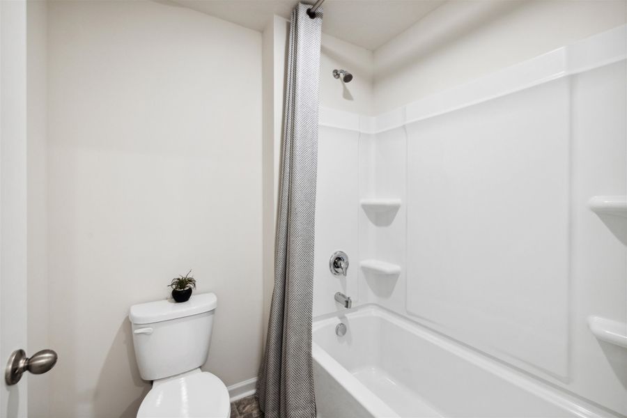Representative furnished interior of a home built from the Hayden by D.R. Horton in Hillcrest Landing, McDonald (Image 23).