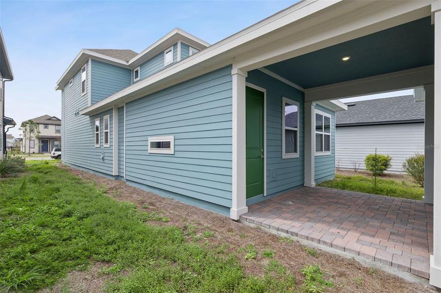 Exterior details and patio area of a home in Weslyn Park at Sunbridge, St. Cloud (Image 25).