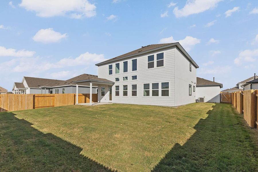 Exterior details and patio area of a home in Enclave at Cele, Pflugerville (Image 23).