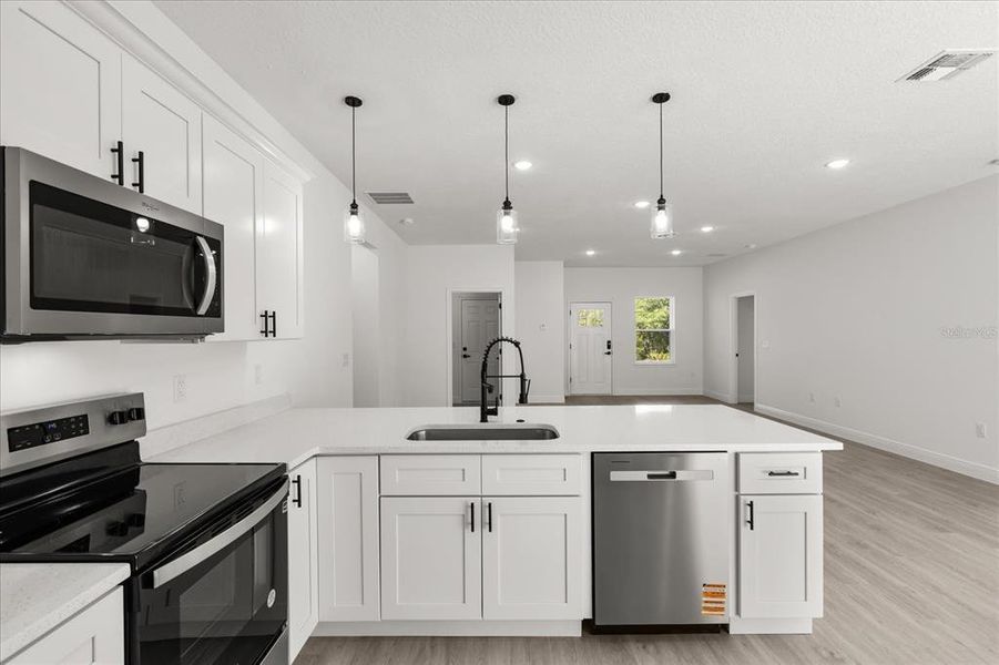 Furnished interior view inside a new home in , Dunnellon (Image 2).