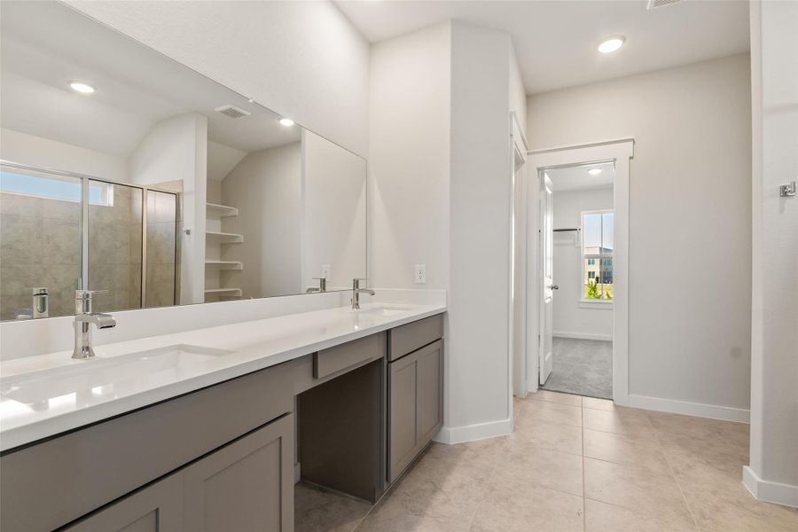 Furnished interior view inside a new home in Sunterra, Katy (Image 12).