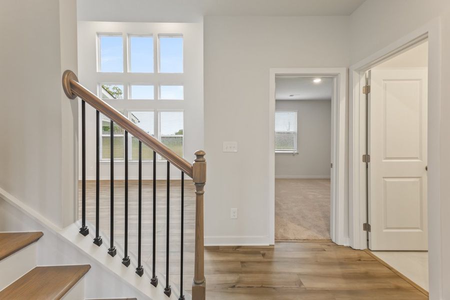 A staircase in a house. A staircase in a house.