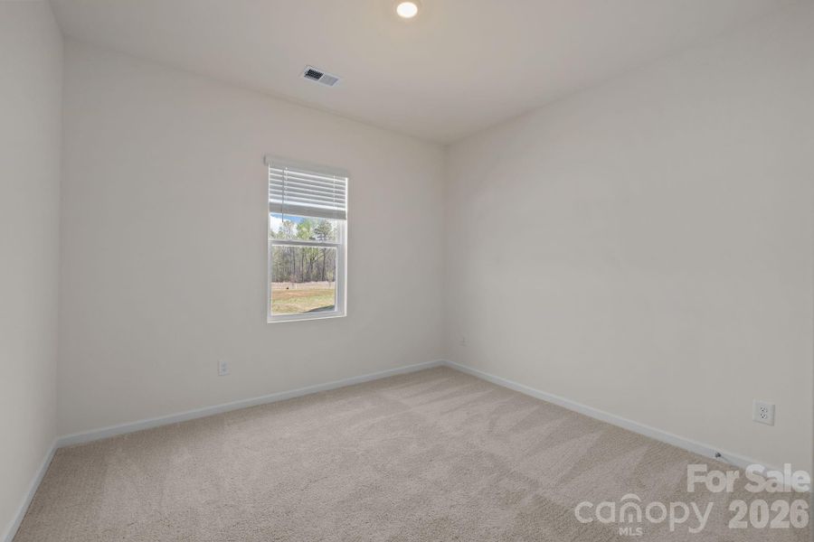 Spacious, unfurnished interior of a new home in McFarland Estates, York (Image 30).