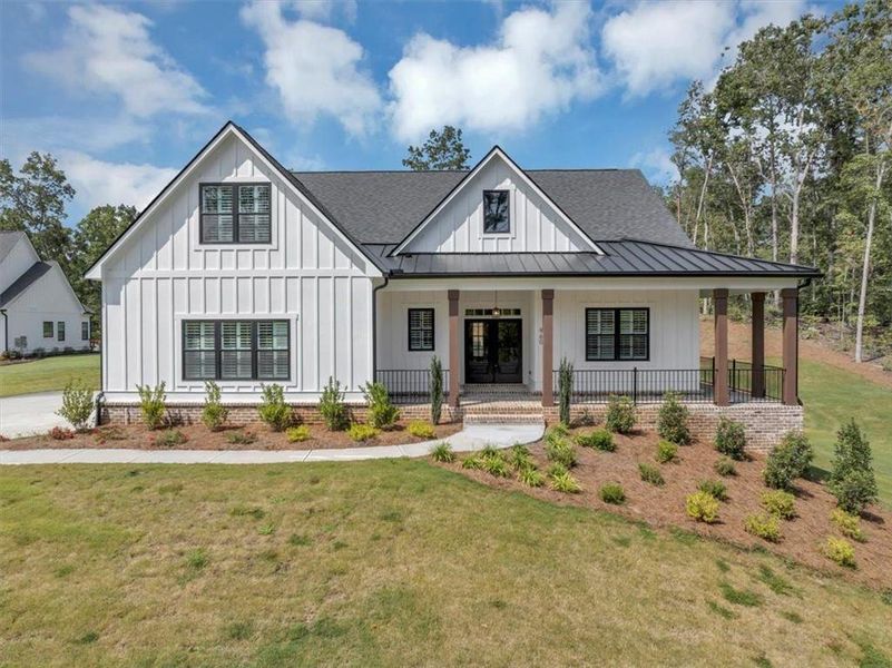 Front exterior of a new home in , Ball Ground, GA, highlighting curb appeal (Image 23).