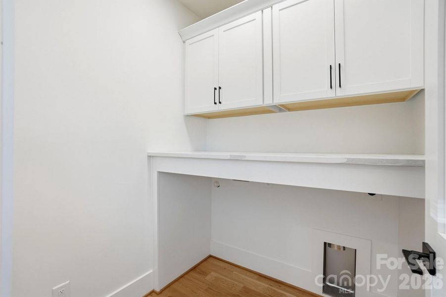 Built in folding table in laundry room