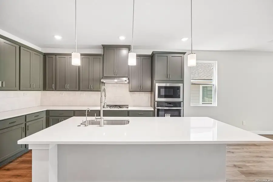Furnished interior view inside a new home in Weston Oaks, San Antonio (Image 12).