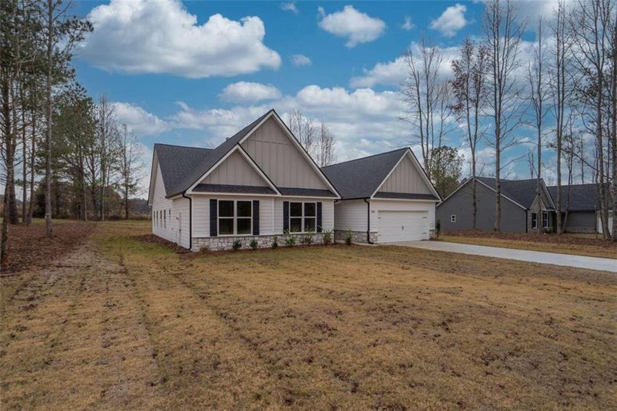 Front exterior of a new home in , Good Hope, GA, highlighting curb appeal (Image 2).
