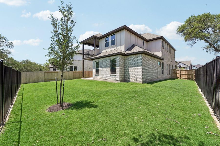 Exterior details and patio area of a home in Persimmon, Buda (Image 16).