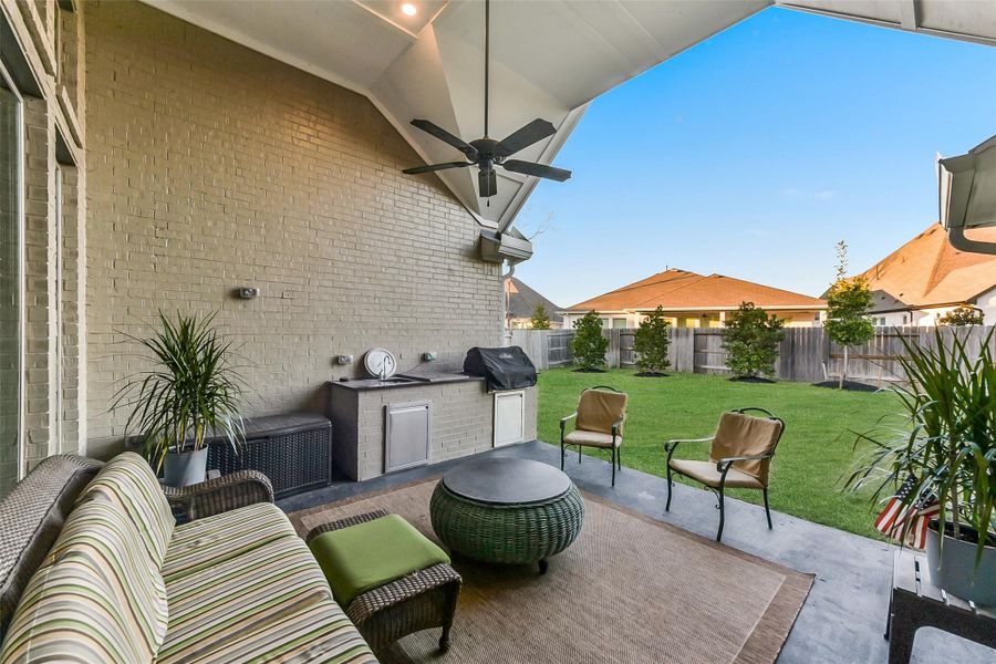 Exterior details and patio area of a home in ARTAVIA 65', Conroe (Image 24).