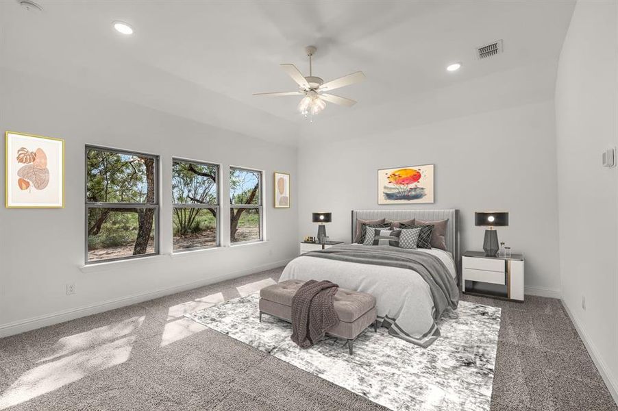 Virtually staged bedroom with recessed lighting, carpet flooring, and a ceiling fan