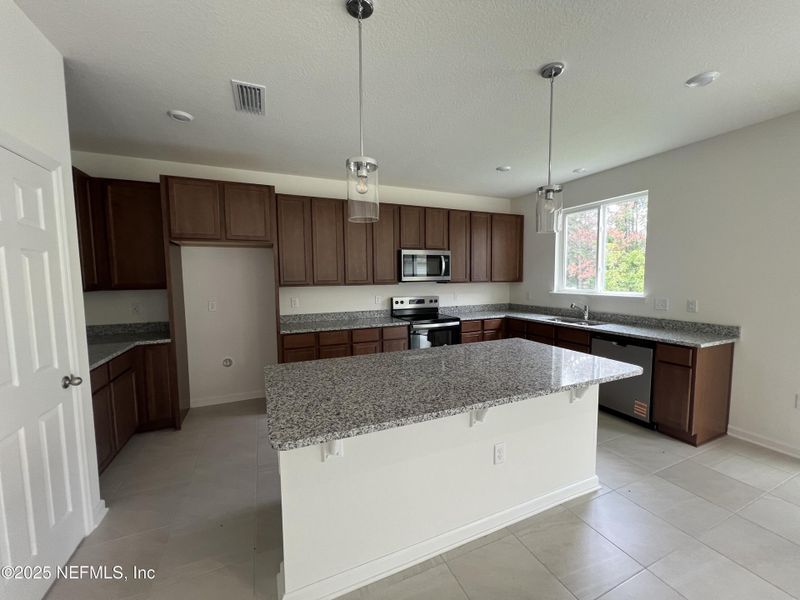 Furnished interior view inside a new home in , Jacksonville (Image 4). Furnished interior view inside a new home in , Jacksonville (Image 4).