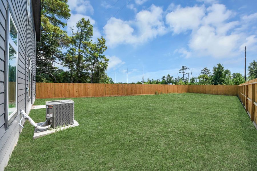 Exterior details and patio area of a home in , Huffman (Image 4).