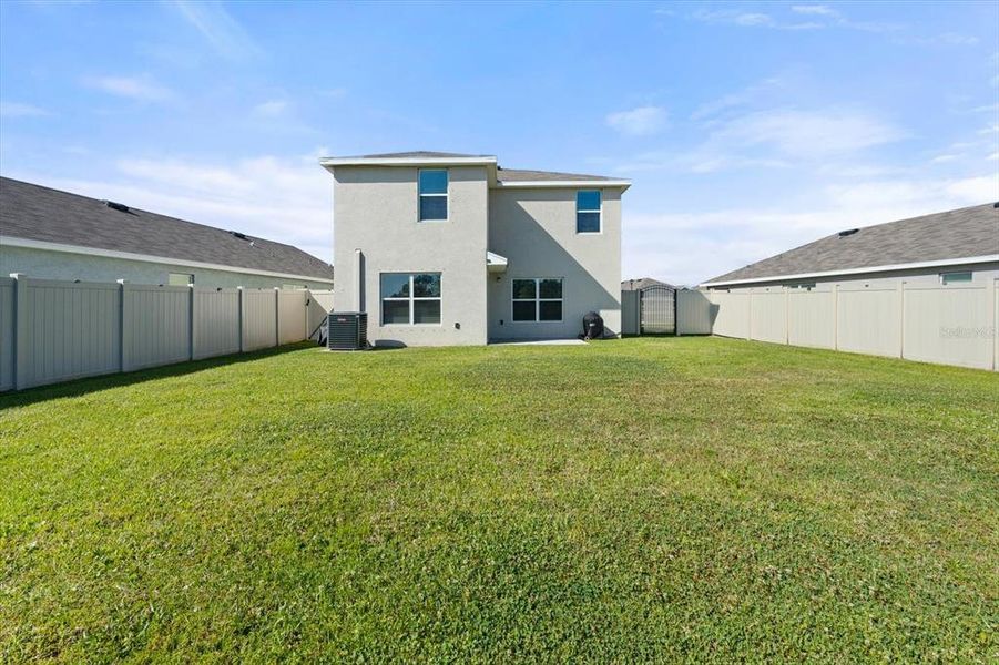 Front exterior of a new home in Silverstone North, Palmetto, FL, highlighting curb appeal (Image 23).