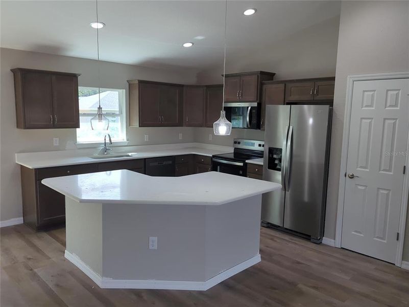 Furnished interior view inside a new home in , Dunnellon (Image 9).
