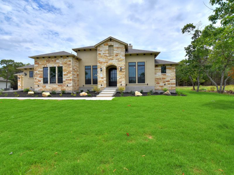 Representative exterior photo of a completed home built from the Avalon by Giddens Homes in Scofield Farms Estates, Georgetown, TX (Image 31).