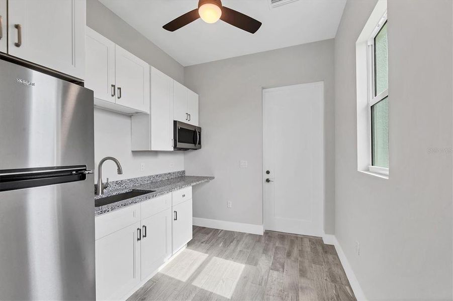 Furnished interior view inside a new home in , Port Charlotte (Image 10).