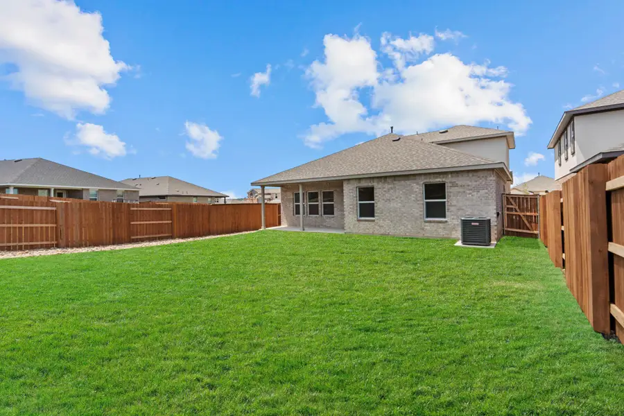 Exterior details and patio area of a home in Bar W Ranch, Leander (Image 3).