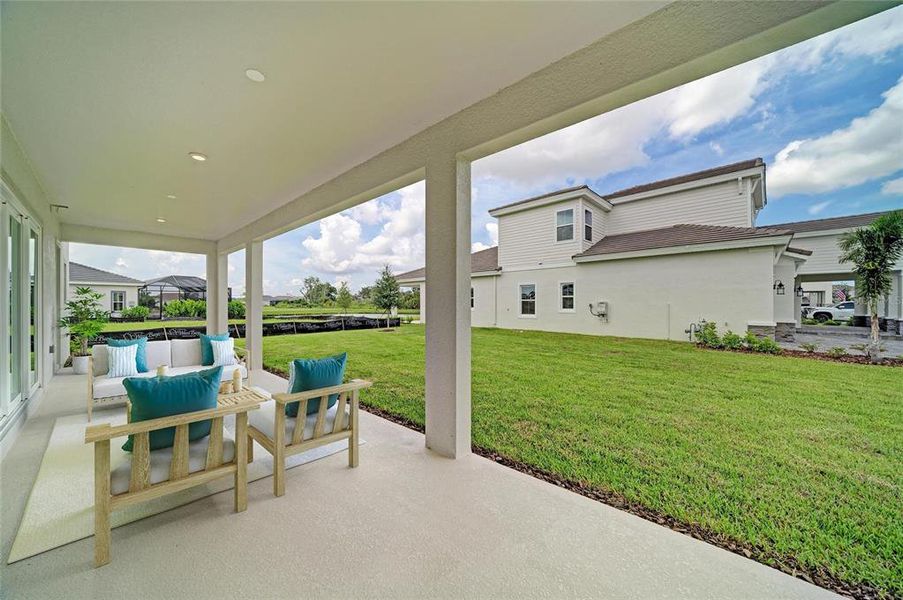 Exterior details and patio area of a home in North River Ranch, Parrish (Image 2).