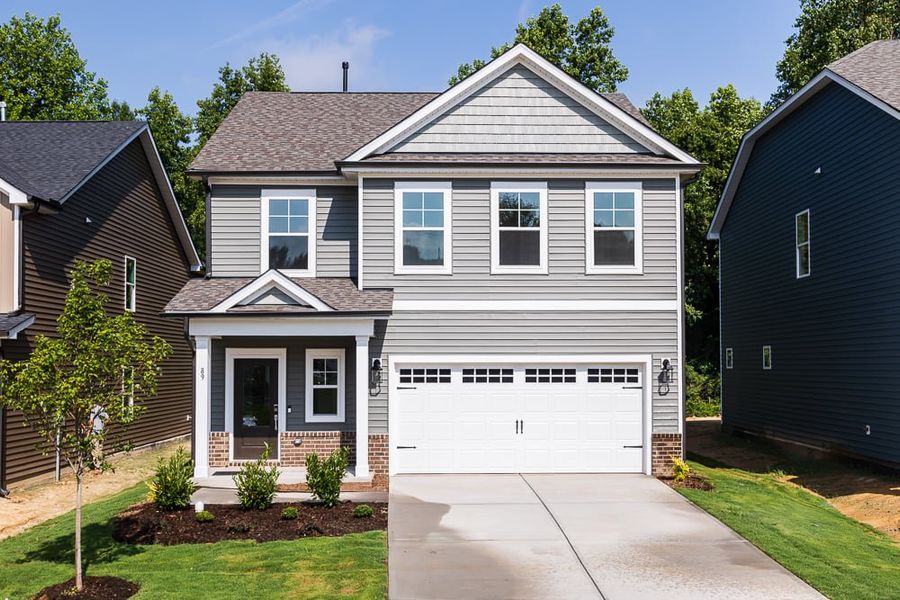 Representative exterior photo of a completed home built from the Stella by Taylor Morrison in Camden, Willow Spring, NC (Image 1). Representative exterior photo of a completed home built from the Stella by Taylor Morrison in Camden, Willow Spring, NC (Image 1).