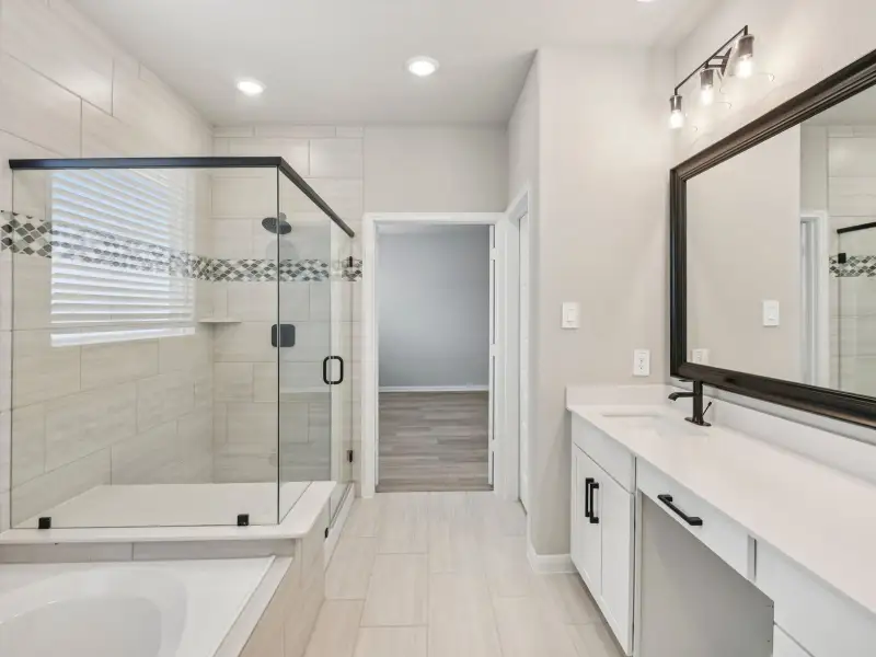 Furnished interior view inside a new home in Pinewood Trails - Luxe Series, Atascocita (Image 8). Furnished interior view inside a new home in Pinewood Trails - Luxe Series, Atascocita (Image 8).