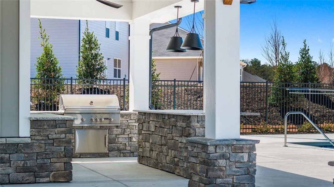 Exterior details and patio area of a home in Champion's Run, Lithonia (Image 2).