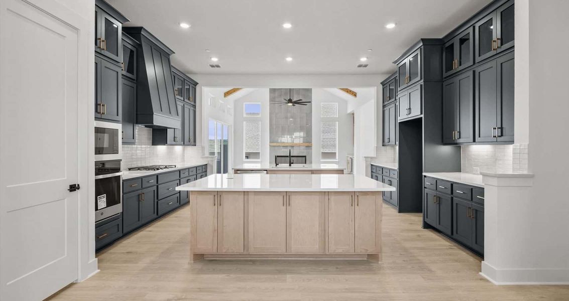 Representative furnished interior of a home built from the Everly by Chesmar Homes in Sweetwater, Austin (Image 5).