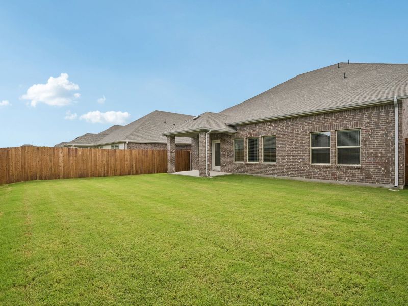 Exterior details and patio area of a home in Parks at Foster Crossing - Signature Series, Anna (Image 2). Exterior details and patio area of a home in Parks at Foster Crossing - Signature Series, Anna (Image 2).