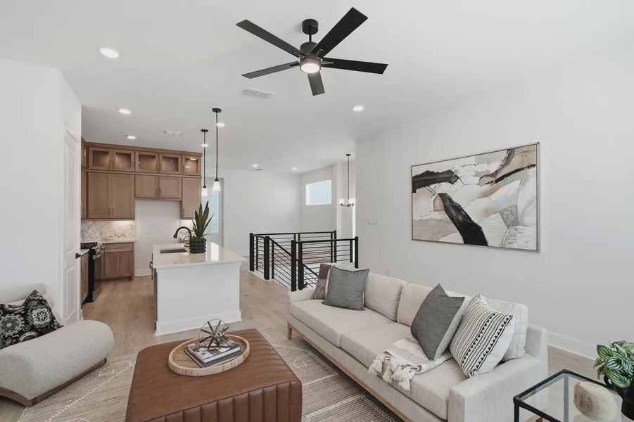 Furnished interior view inside a new home in Centero at Stone Oak, San Antonio (Image 9).