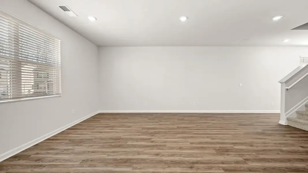 Representative unfurnished interior of a home built from the Saratoga by D.R. Horton in Branford Crossing, Stockbridge (Image 14).