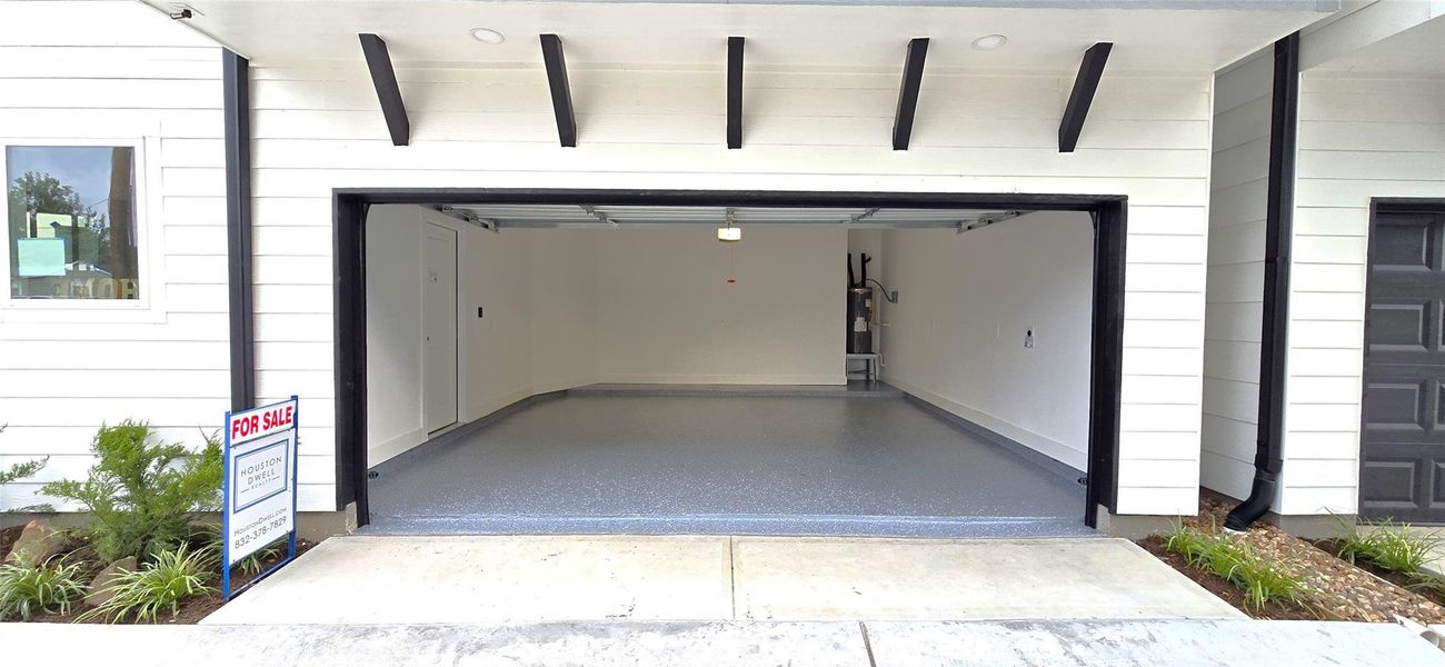 Textured garage floor with epoxy coating. (optional)