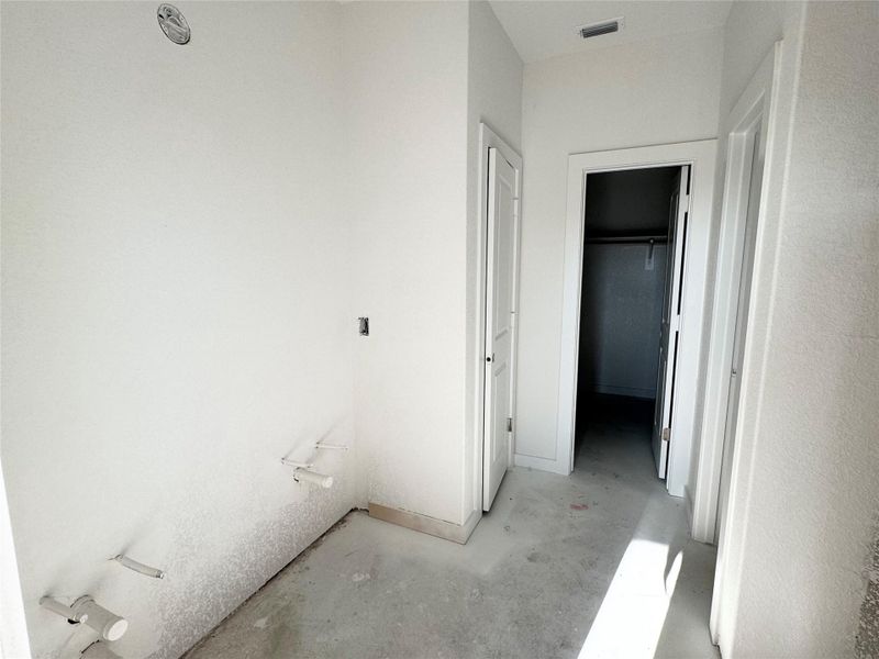 Hall featuring baseboards