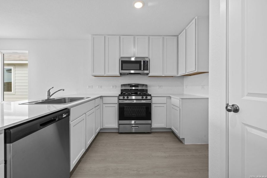 Furnished interior view inside a new home in Spring Grove, St. Hedwig (Image 3).