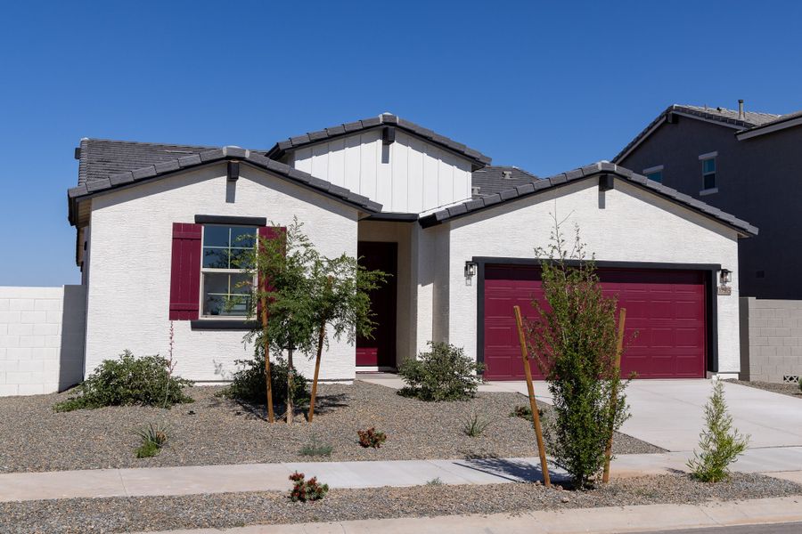 Front exterior of a new home in Rancho Santa Rosa, Maricopa, AZ, highlighting curb appeal (Image 2). Front exterior of a new home in Rancho Santa Rosa, Maricopa, AZ, highlighting curb appeal (Image 2).