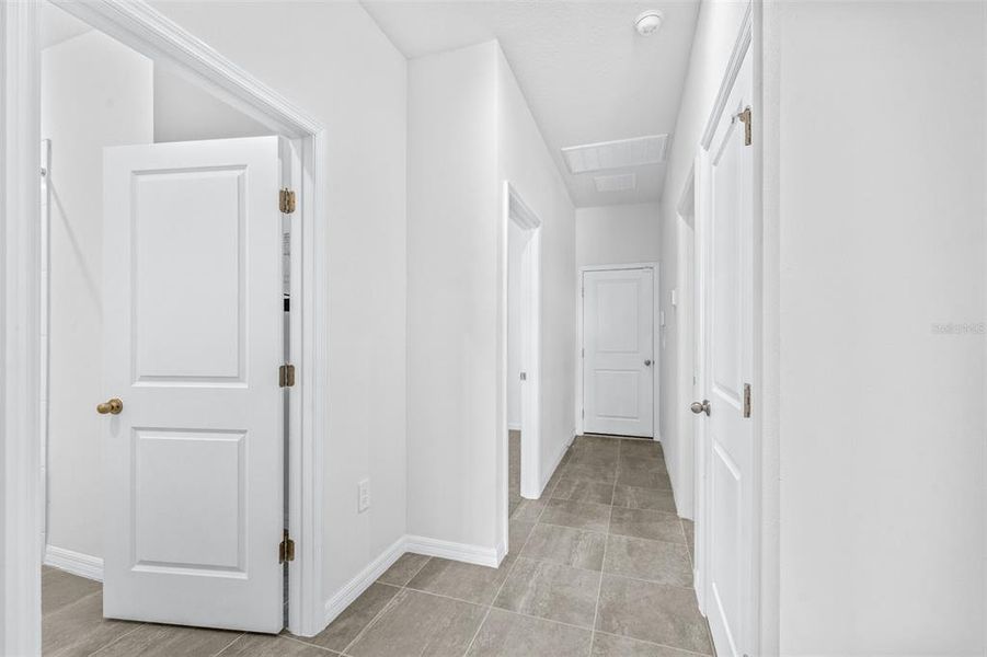 Spacious, unfurnished interior of a new home in The Grove at Stuart Crossing - Premier Series, Bartow (Image 34).