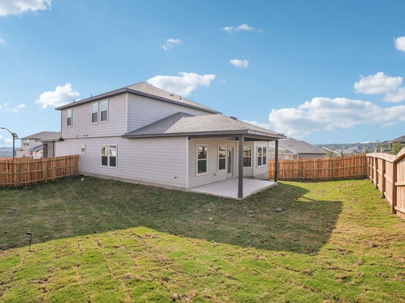 Exterior details and patio area of a home in Lark Canyon, New Braunfels (Image 3).