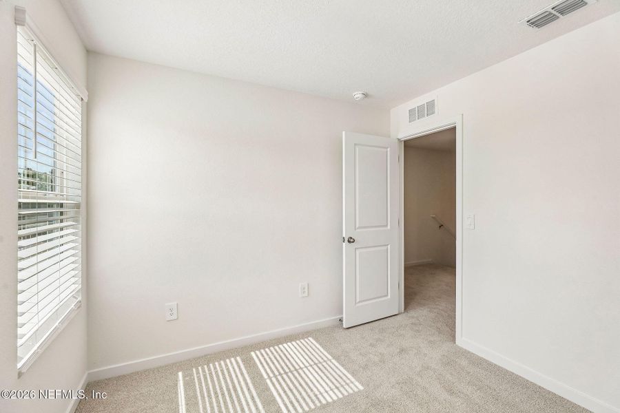 Spacious, unfurnished interior of a new home in The District at Oakleaf - The Grove, Middleburg (Image 14).
