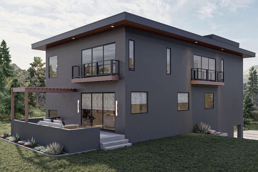 Back of property featuring a balcony, stucco siding, a pergola, an outdoor hangout area, and a yard