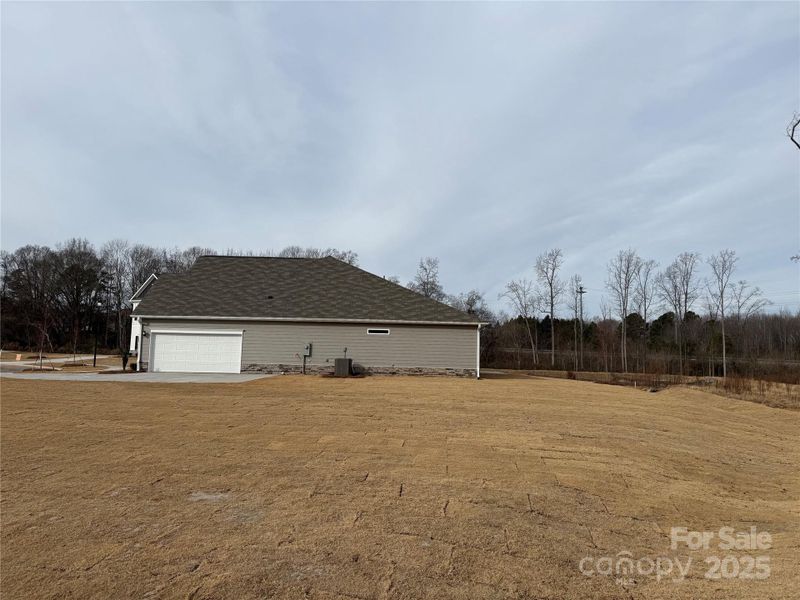 Exterior details and patio area of a home in Cedar Meadows, Monroe (Image 3).