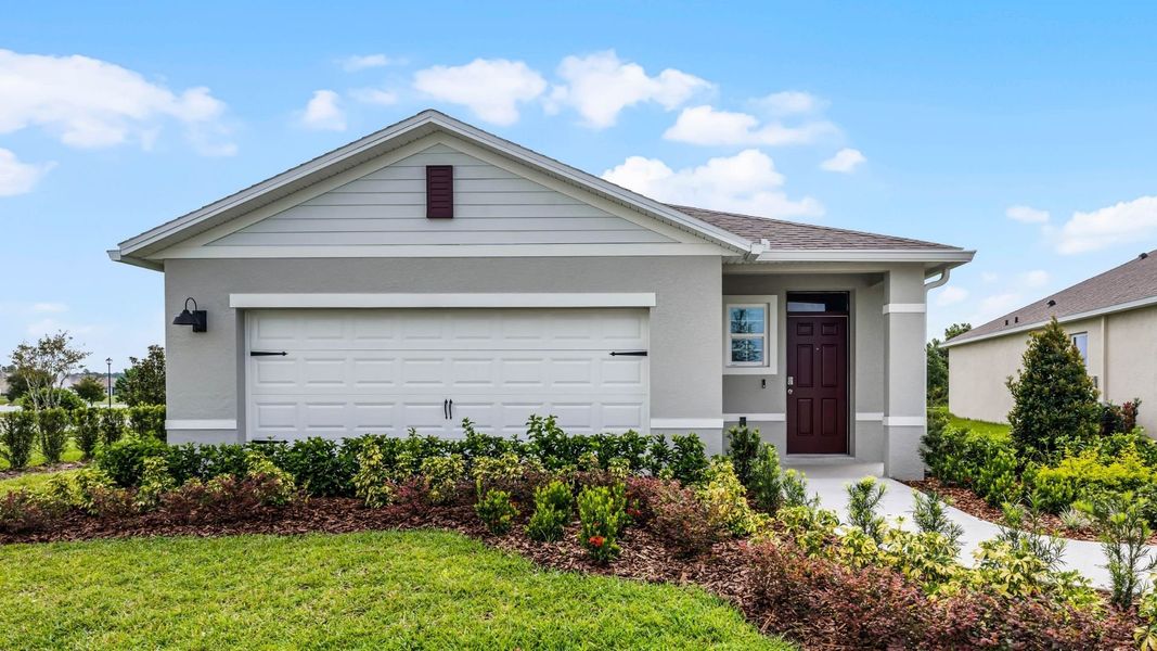 Representative exterior photo of a completed home built from the HARPER by D.R. Horton in Wynwood, Ocoee, FL (Image 1).