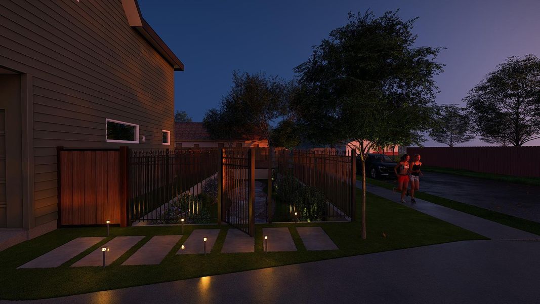 View of yard featuring a gate View of yard featuring a gate