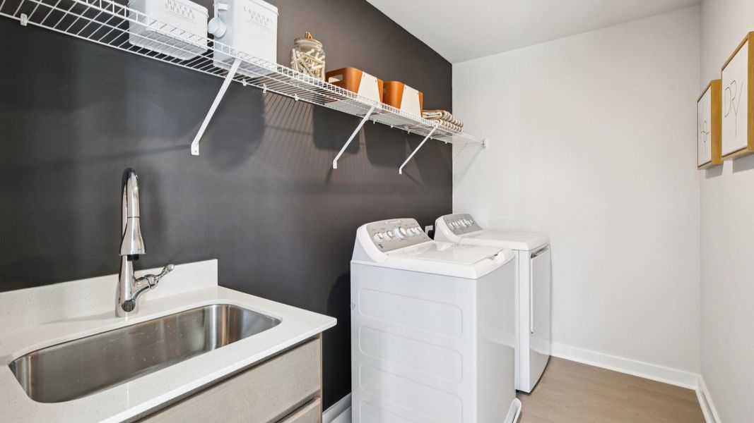 Adding to the convenience, enjoy dedicated laundry rooms with shelving right near the bedrooms