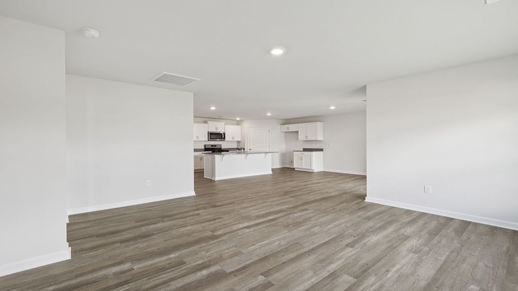 Spacious, unfurnished interior of a new home in Bentley Park, Greenwood (Image 22).