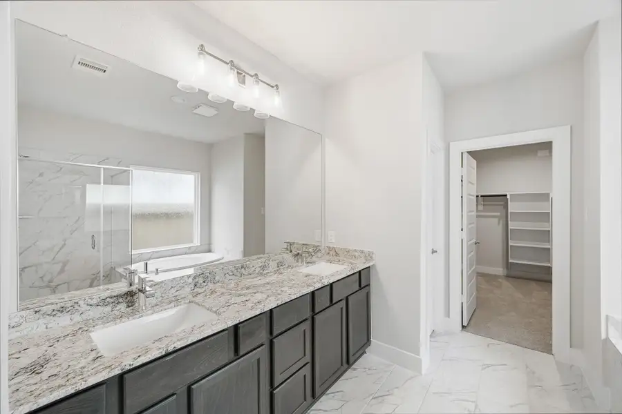 Furnished interior view inside a new home in Barton Creek Ranch, Conroe (Image 11).